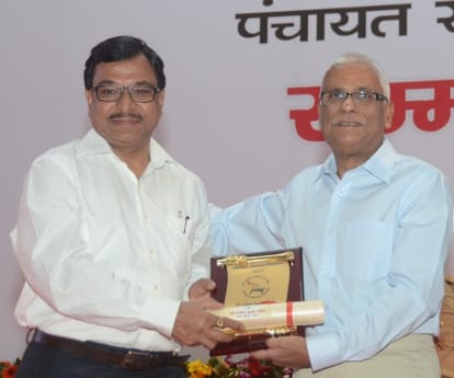State election commissioner honours officers.