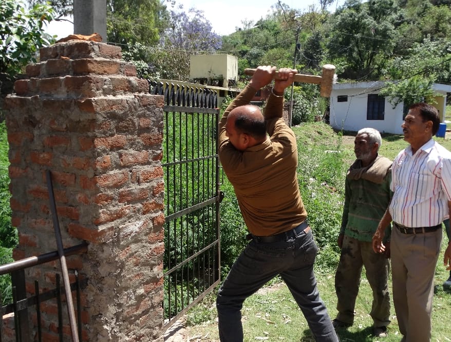 The gate broken which is on Devika way