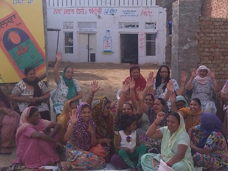 Alcohol contract, demanded off, sit-in protest by women, Sangrur