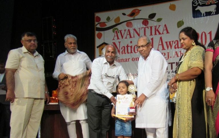 award for girl and granddaughter on same stage