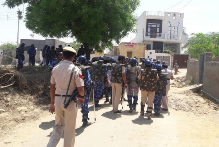 police team kidnapped by villagers, finance minister house fire incident, haryana voilence, rohtak