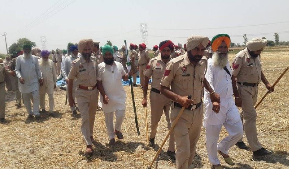 in front of police team Indebted farmer commit suicide with mother