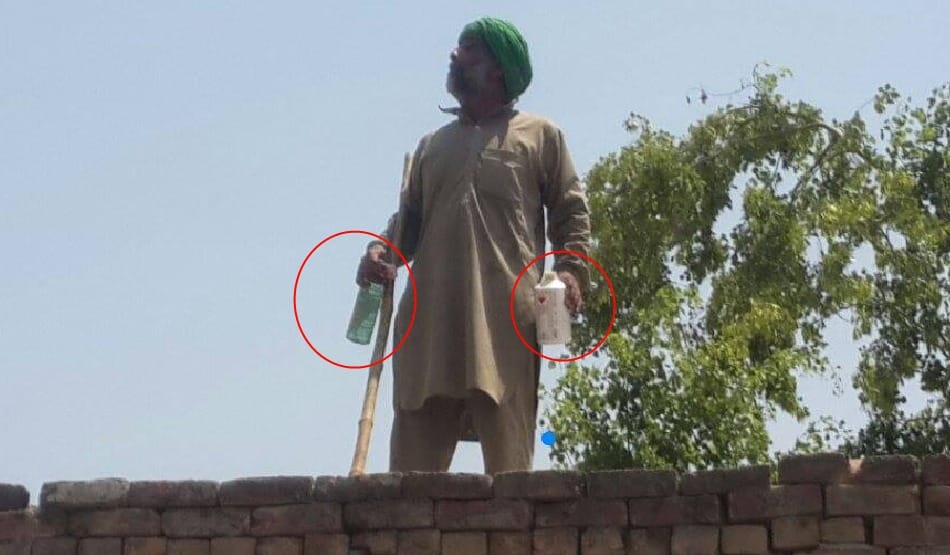 in front of police team Indebted farmer commit suicide with mother