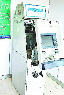 ATM thieves entered by breaking the wall