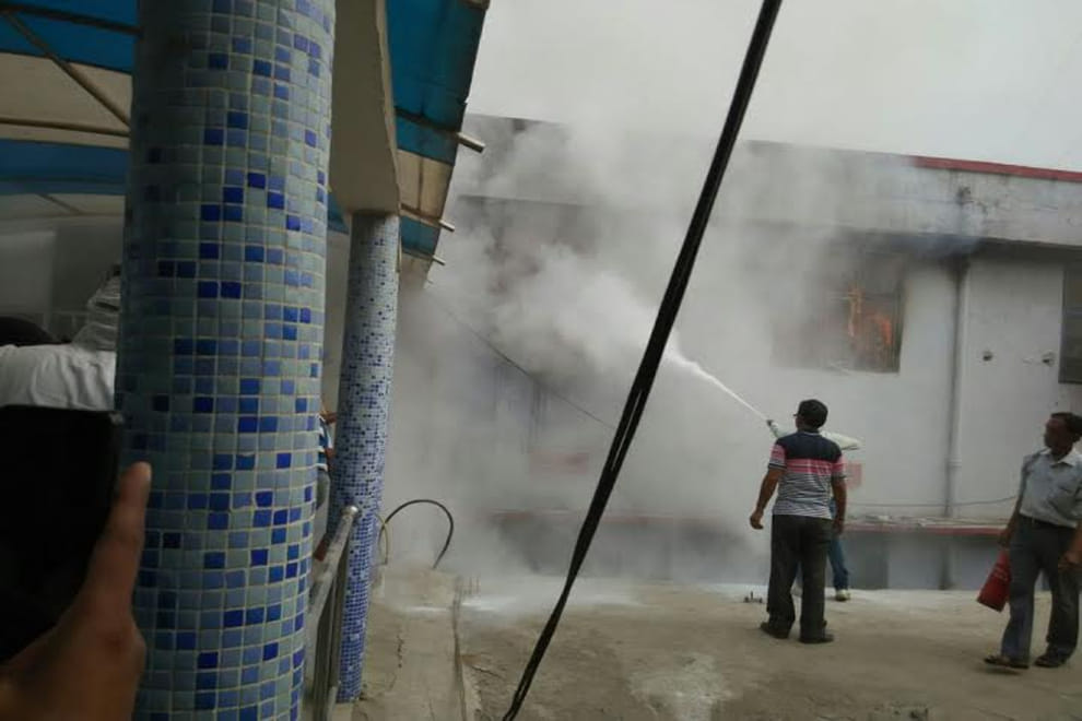 Thousands goods ashes into flames