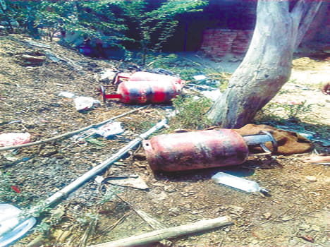 Cylinder fire, woman and two scorched