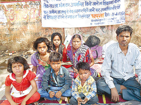 Children and women with her husband sitting on hunger strike
