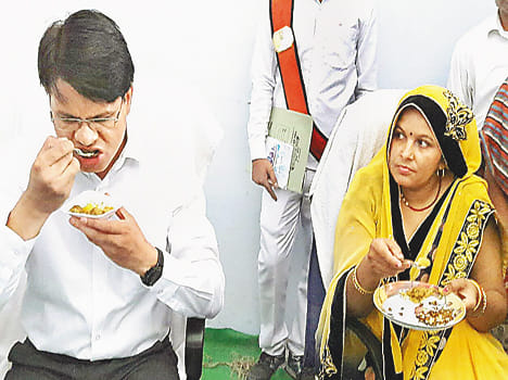 Warm meals to malnourished children and pregnant