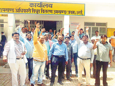 Electrical workers protesting performing