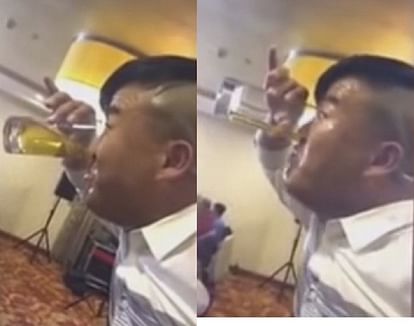 Man necks glass of beer through his NOSE in bizarre stunt