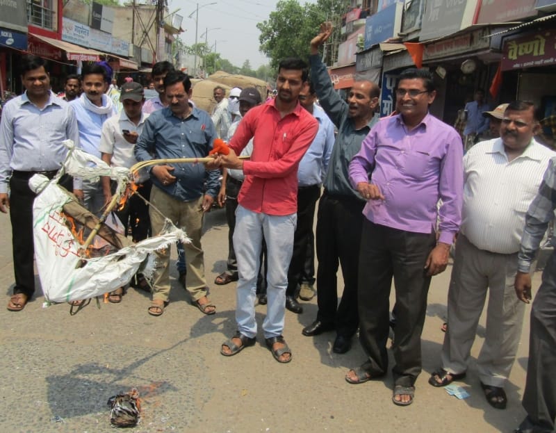 Burned effigies of the new pension scheme