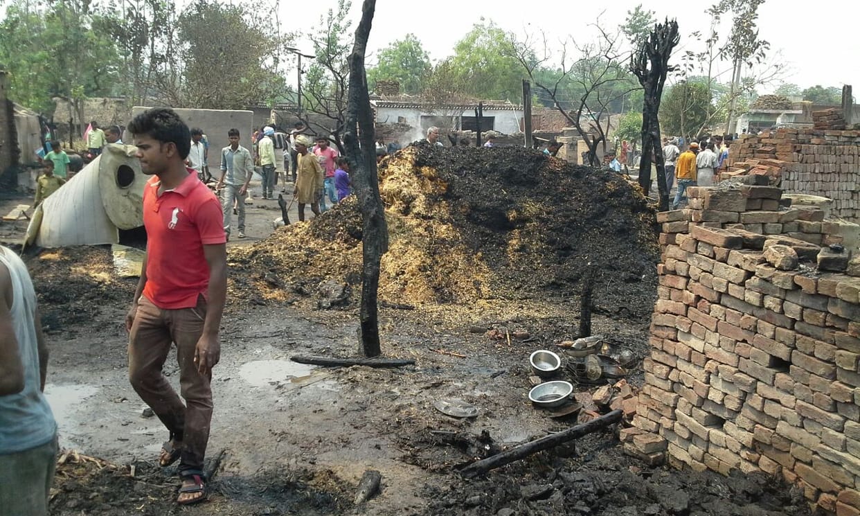 A dozen house fire ashes, woman's death
