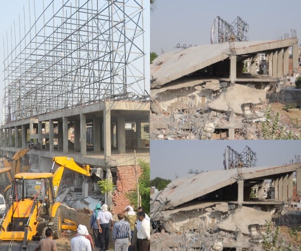 Building demolition in Jiyamau.