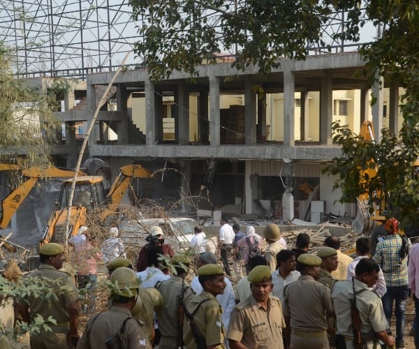 Building demolition in Jiyamau.