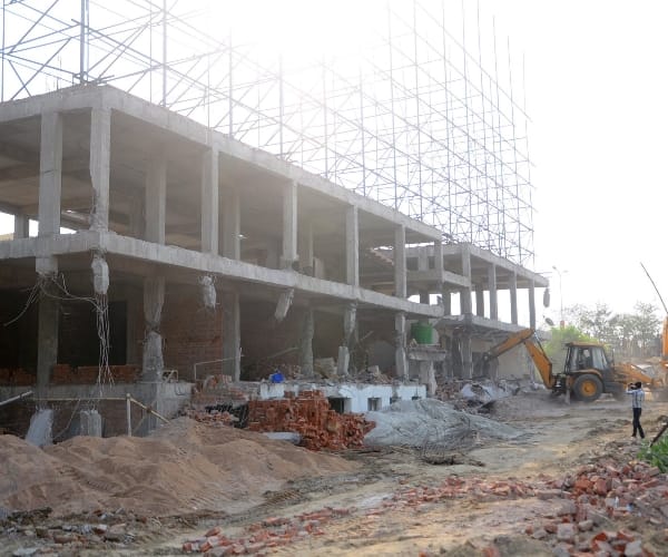 Building demolition in Jiyamau.
