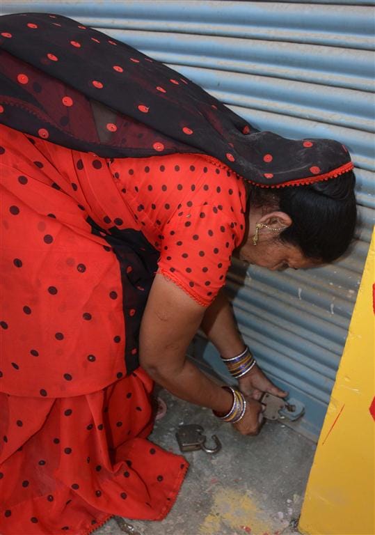 Women contract workers hostage , nailed lock