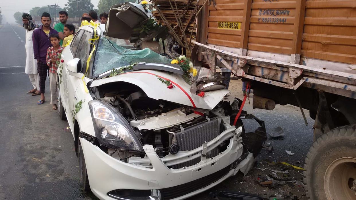 Bridegroom car crushed into standing truck