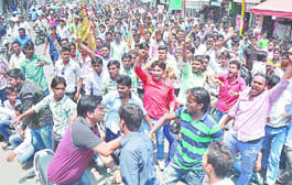 Dalits boil, marches, jam