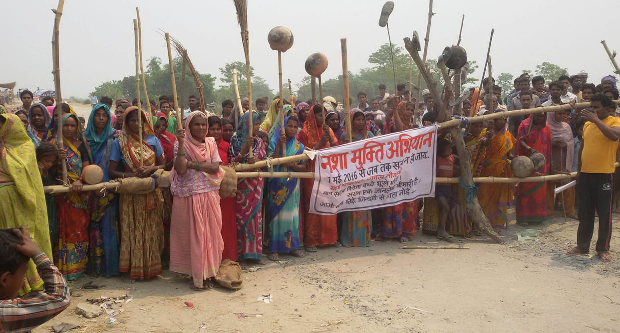 protest against liquor shop, road jam