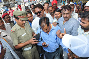 crowd protest in ration card