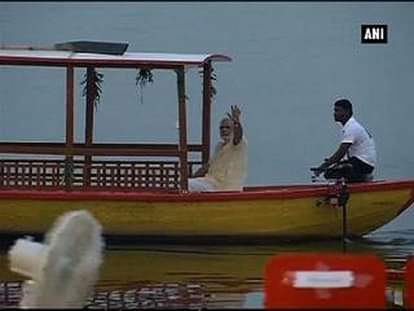 PM Modi enjoys e-boat ride in Varanasi