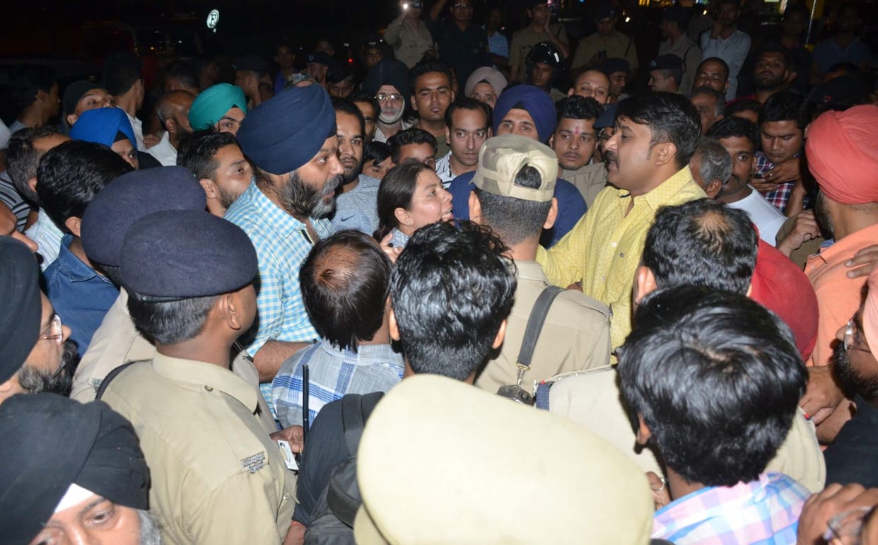 woman slapped on businessman in dehradun.