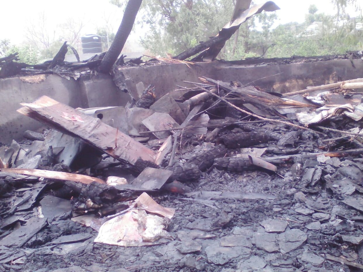 house on fire in forest fire 