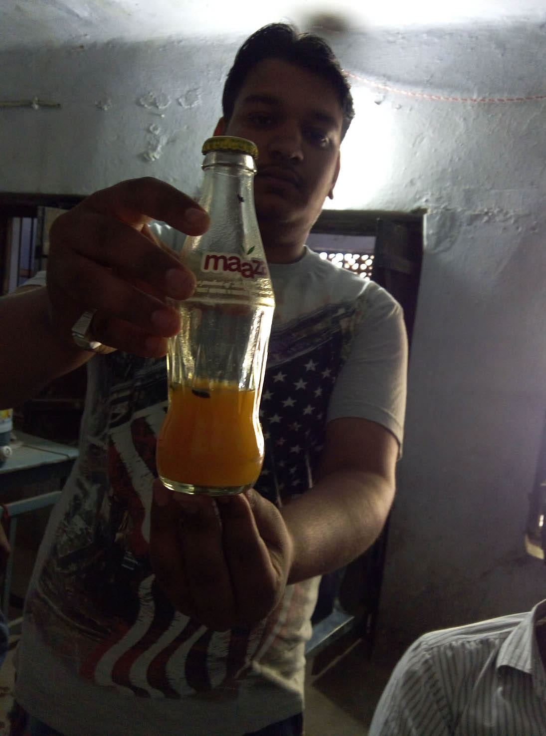 Bugs in the cold drink bottle, ailing man