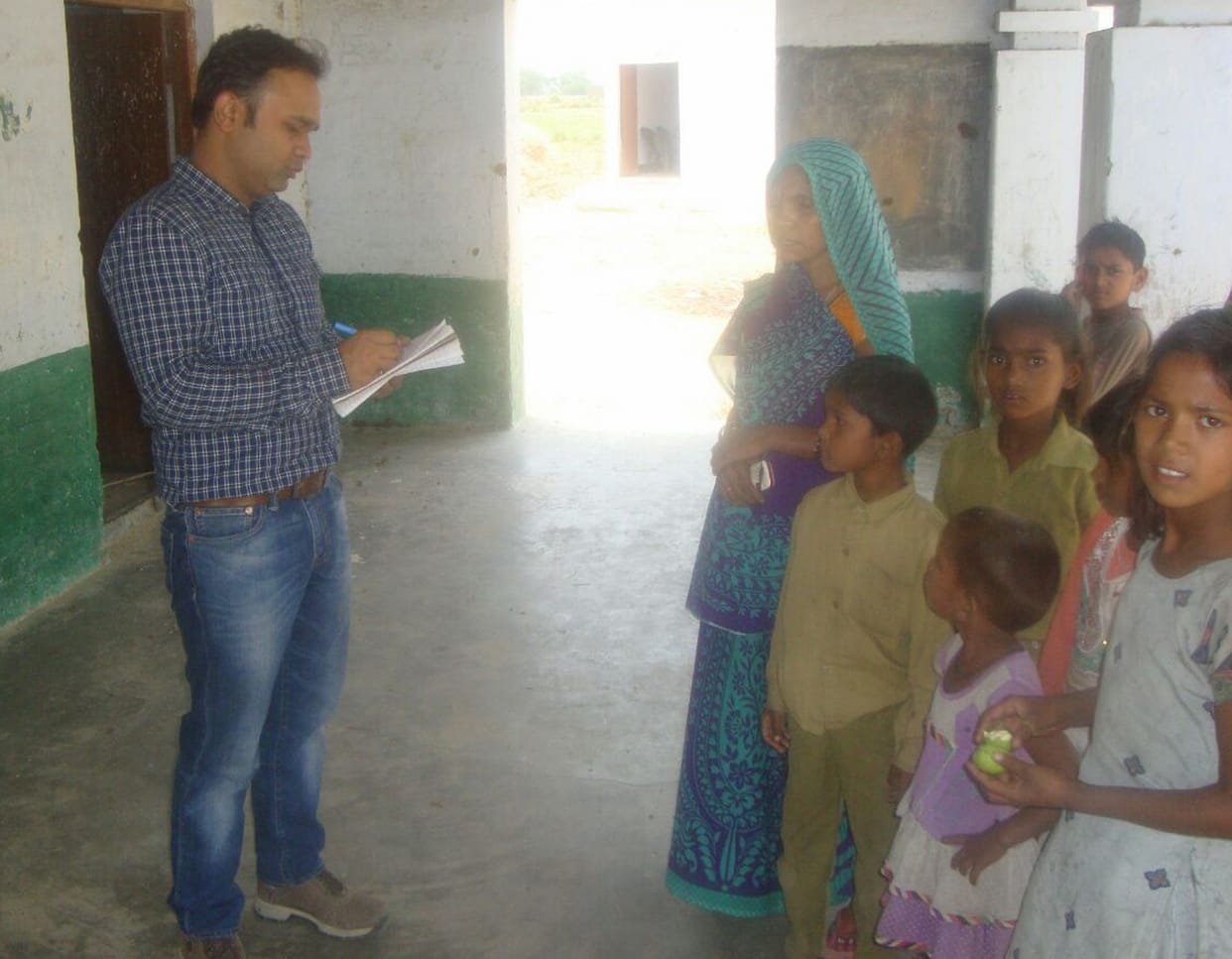 Kitchen full of books, children deprived of milk