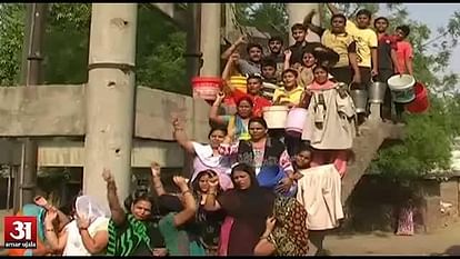 Women in kanpur protest with their husband's police uniform against water crisis