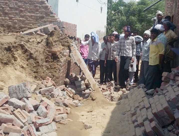 The wall under construction collapsed, killing a child