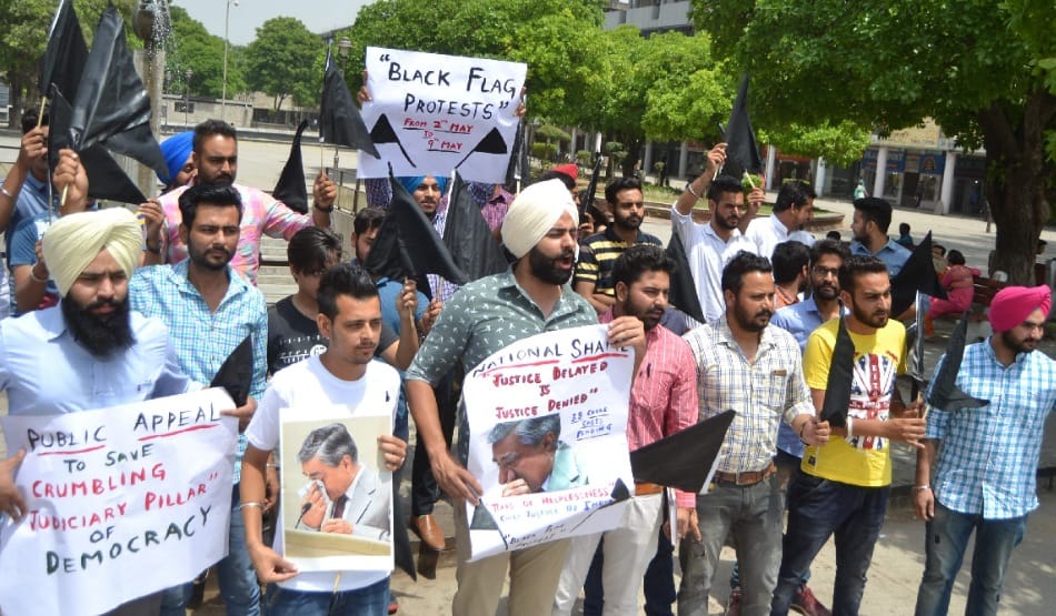 students protest against pending cases over years