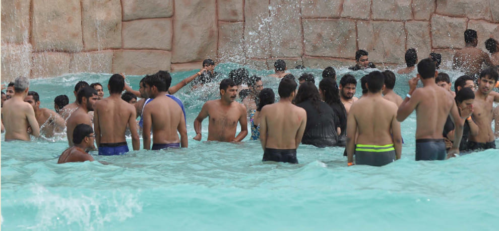 water crisis and people enjoying in water parks in gurgaon  