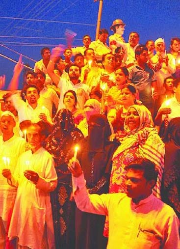 Candle march against private schools