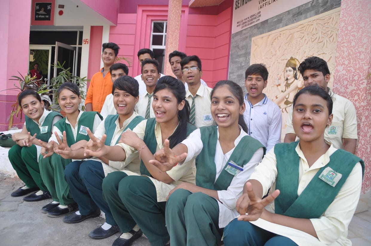 Aman in the 10th , 12th joyful topper