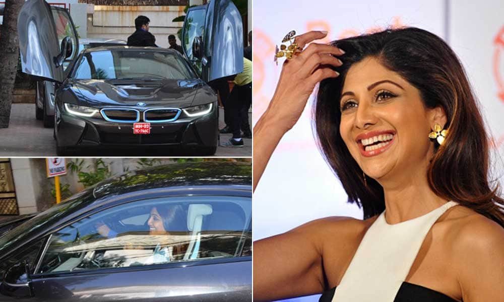 Shilpa Shetty in her new expensive BMWi8 car