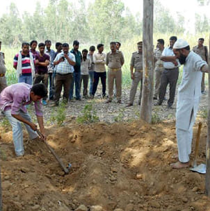 body was removed from the grave