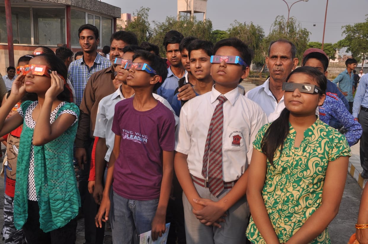 people look the transit of murcury across sun