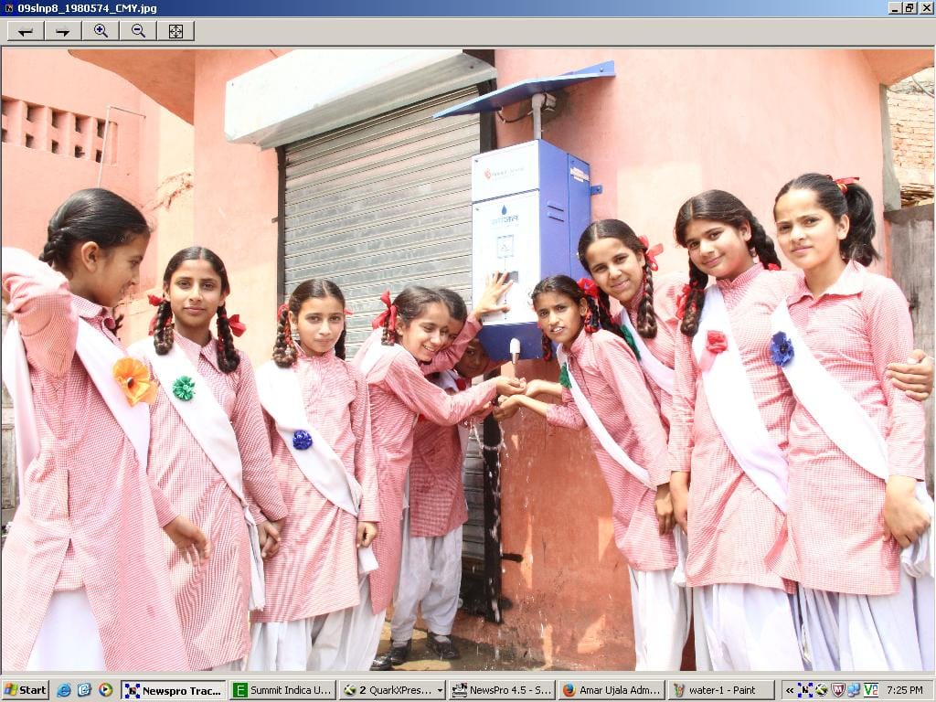 water atm in the hand of woman