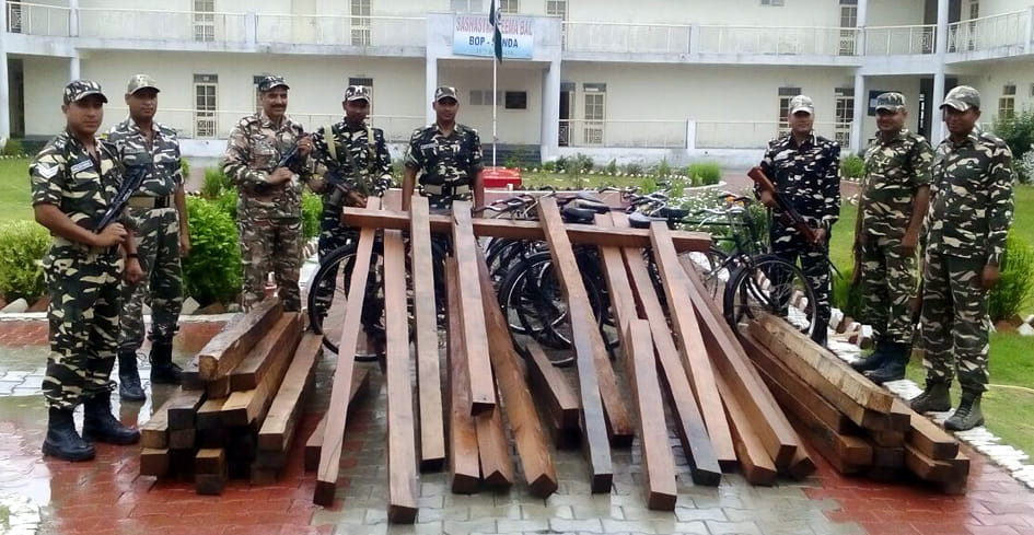 Ten bicycles laden on Saku recovered wood
