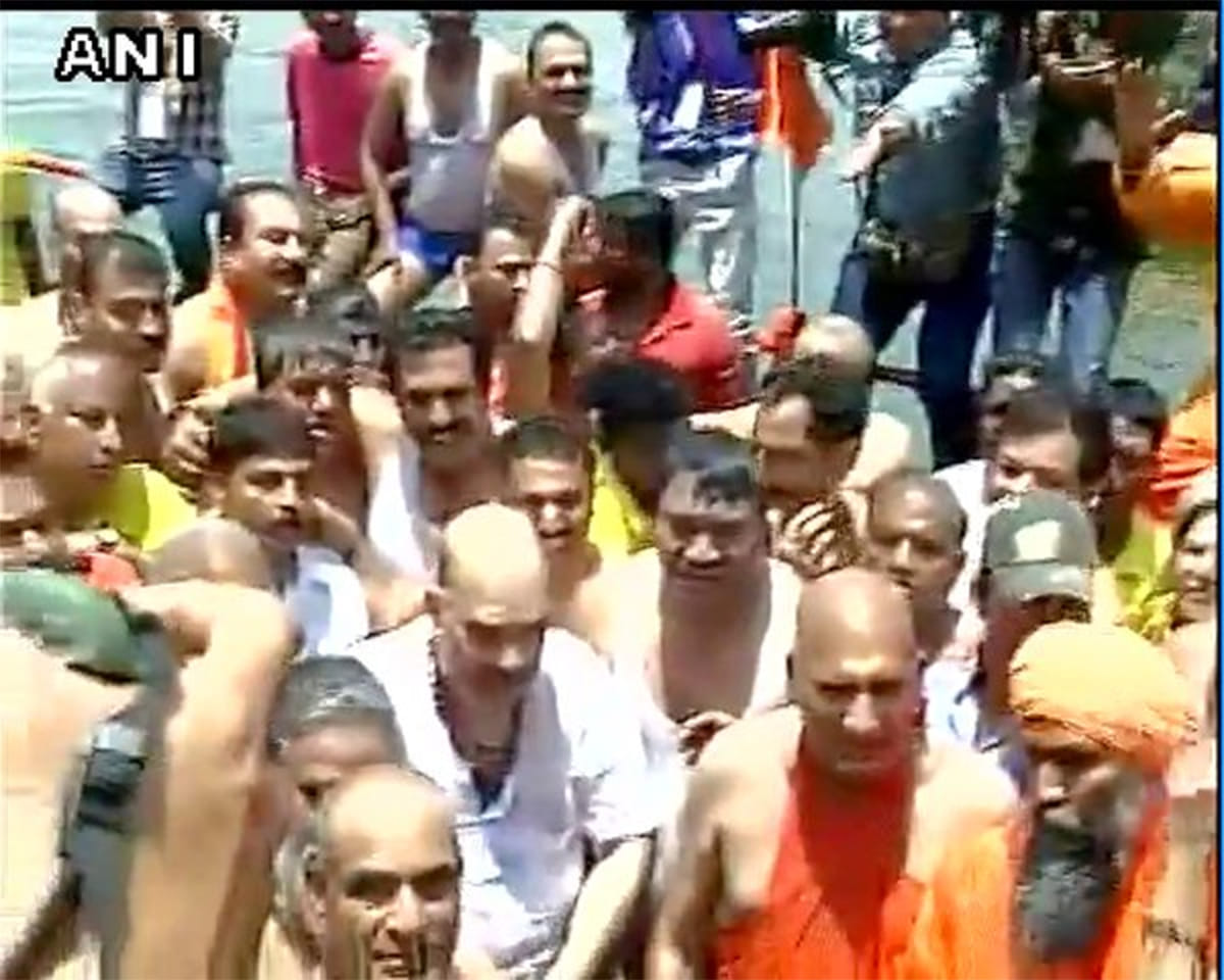 BJP President Amit Shah takes holy dip at Valmiki Ghat