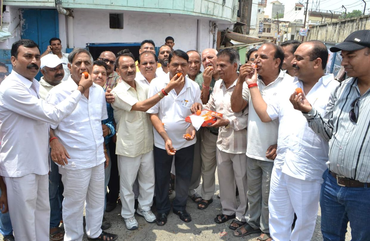 congressman celebrated of restoration of Rawat's govt.