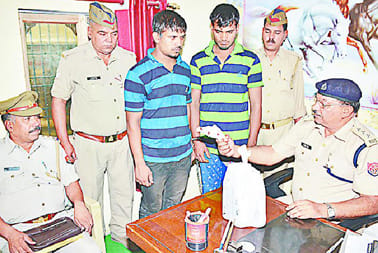 Police arrested two liquor smuggler