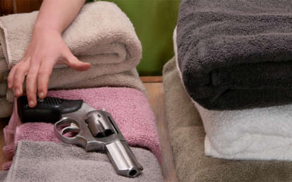 brother playing with gun, 10 year old dies in fire