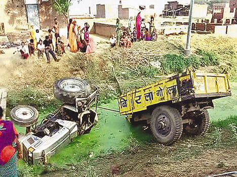 Reversing the tractor trolley driver escaped death