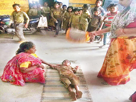 Student fell unconscious from heat