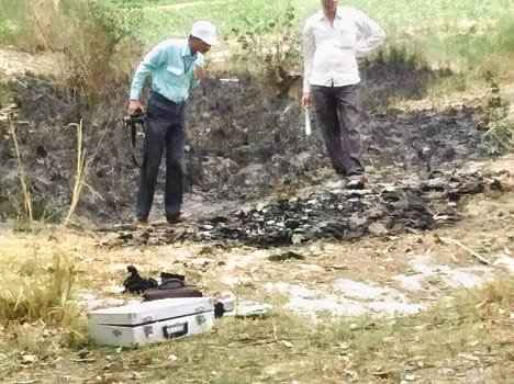 The remains of the bodies taken by police from the funeral pyre