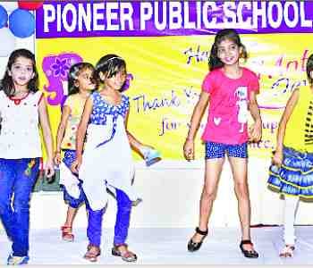 children enjoy the rain dance