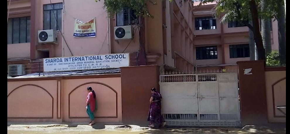Torn ear drum of student by beating 