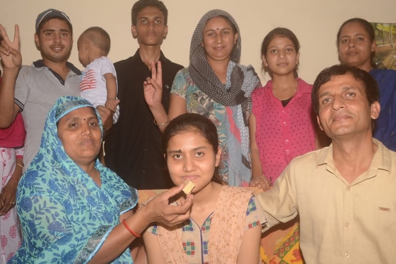 In high school, 92.34, 84.41 per cent in the Intermediate Result